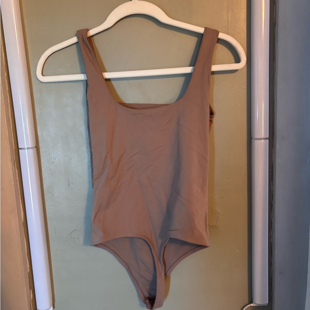 Abercrombie tan bodysuit, never worn
